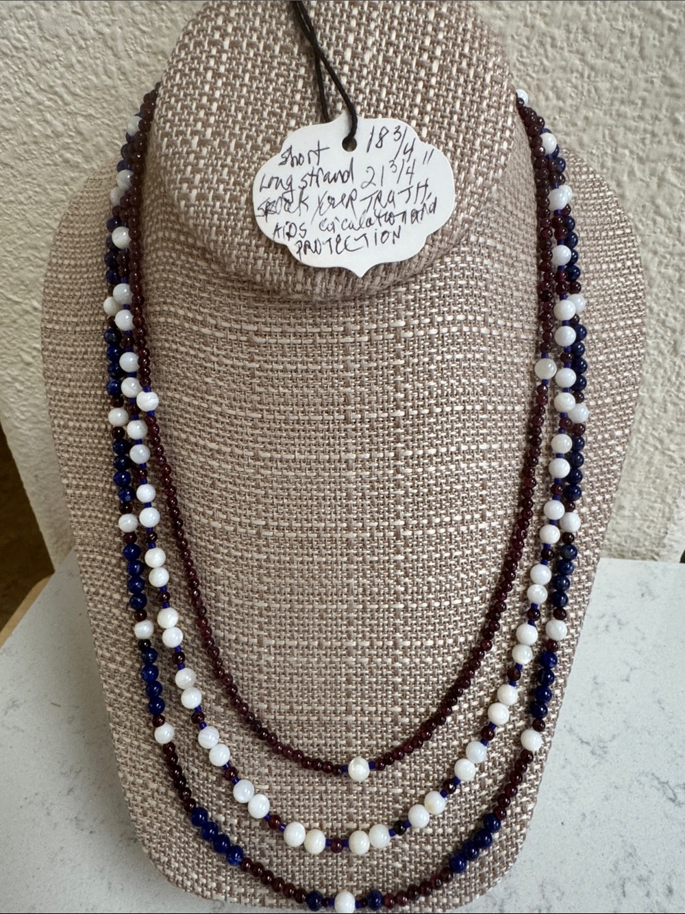 Brand new with tags three strand necklace, CELEBRATE 250!  Garnet, MOP & Lapis